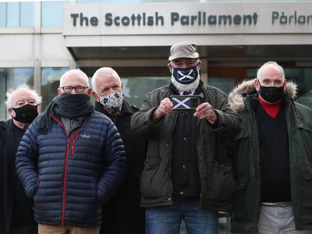 Former miners outside the Scottish Parliament last week