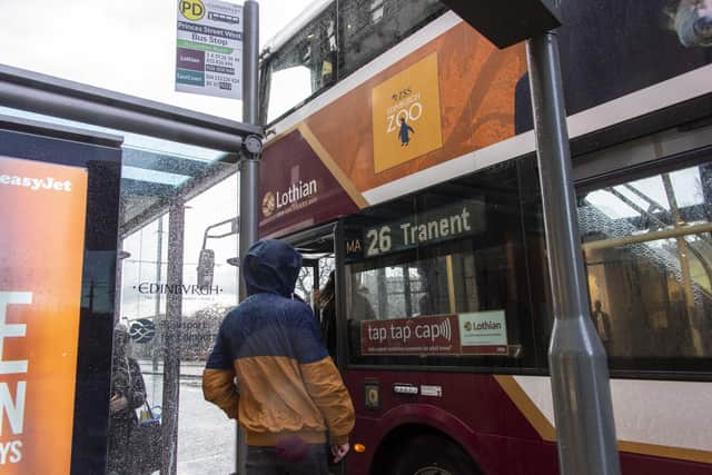 Buses must be hailed in the correct way and passengers should politely discuss their place in the queue to get on (Picture: Andrew O'Brien)