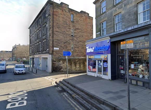 The knife-wielding robber entered Tanz tanning salon in Canonmills around 7.45pm on Friday. Pic: Google