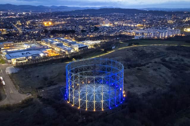 The last surviving gasholder from the Granton Gasworks in North Edinburgh, is illuminated in the colours of the Ukrainian flag as a gesture of solidarity with the people of Ukraine following the Russian invasion. Picture: Jane Barlow/PA Wire