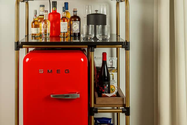 Each room will have a fully stocked mini-fridge and bar.