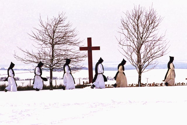 Monks from Nunraw walking through the snow in February 1991.