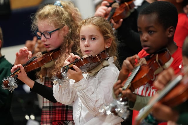 These youngsters concentrate on delivering the music at the special festive concert in Wester Hailes.