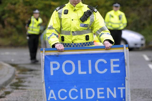 Two people have been rushed to hospital after a crash on Oxgangs Road North, Edinburgh