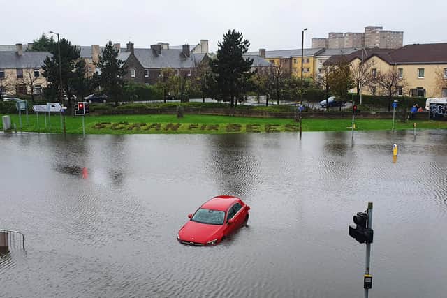 Heavy flooding last month saw cars trapped at busy junction in Granton.  Picture: John Devlin.