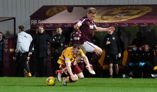Taylor Moore is adjudged to have fouled Connor Shields during Hearts' defeat at Motherwell last month. Picture: SNS