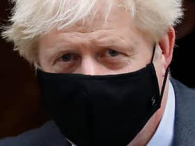 Boris Johnson never liked wearing a face mask. Picture:  Tolga Akmen/AFP