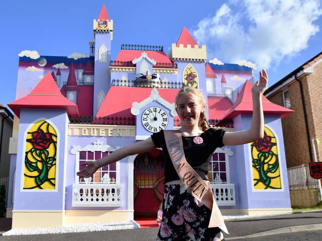 2022 Queen Aimee Gilchrist with her Beauty and the Beast-themed castle