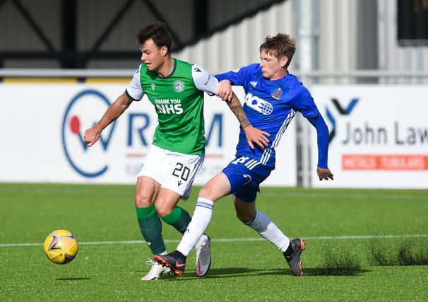 Melker Hallberg looks to give Cove Rangers' Blair Yule the slip at the Balmoral Stadium