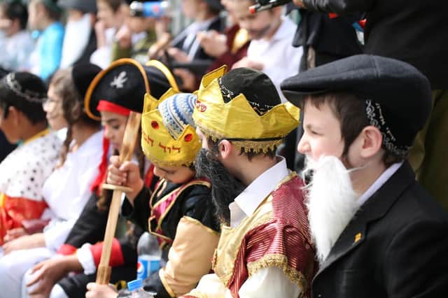 Jewish school children gather and sit in fancy dress during a schools' annual Purim event (Photo: Shutterstock)