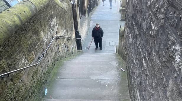 Guillermo del Toro posed at the foot of Milne's Court steps in Edinburgh to recreate a classic shot from The Exorcist
