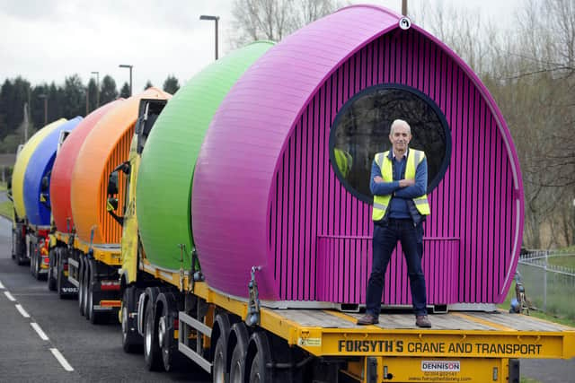 Colourful convoy: Armadilla founder and managing director Archie Hunter with the EdPods as they prepare to leave Bonnyrigg. Picture: Colin Hattersley Photography.