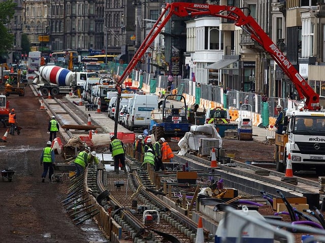 Workmen can be seen here continuing to work on the Edinburgh tram project on Princes Street, on 30 September 2009.