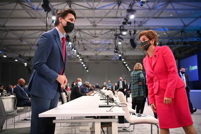 Nicola Sturgeon meets Canadian Prime Minister Justin Trudeau on day two of the COP26 climate change summit (Picture: Jeff J Mitchell/pool/AFP via Getty Images)