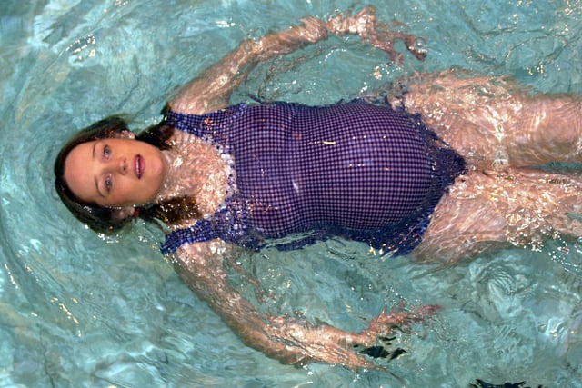 Edinburgh resident Fionualla Munro floating on her back in the Dalry pool when eight months pregnant, in April 2002.