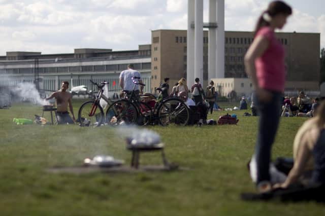 Barbecues in parks can cause fires and damage to the grass (Picture: Axel Schmidt/Getty Images)