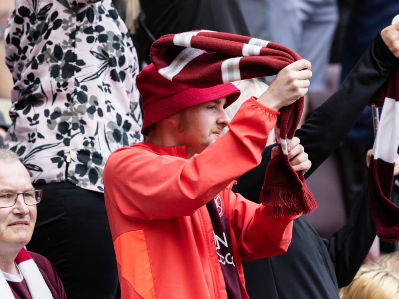 A Hearts fan enjoys the drama