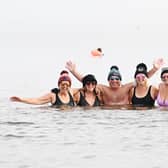 It must have been "bracing" for the swimmers who took the plunge at Portobello at the weekend to mark the book launch - and some of them came kitted out in hats and gloves.