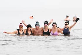It must have been "bracing" for the swimmers who took the plunge at Portobello at the weekend to mark the book launch - and some of them came kitted out in hats and gloves.