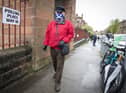 A voter heads to a polling station yesterday but the full results are not expected to be known until tomorrow (Picture: Jane Barlow/PA Wire)