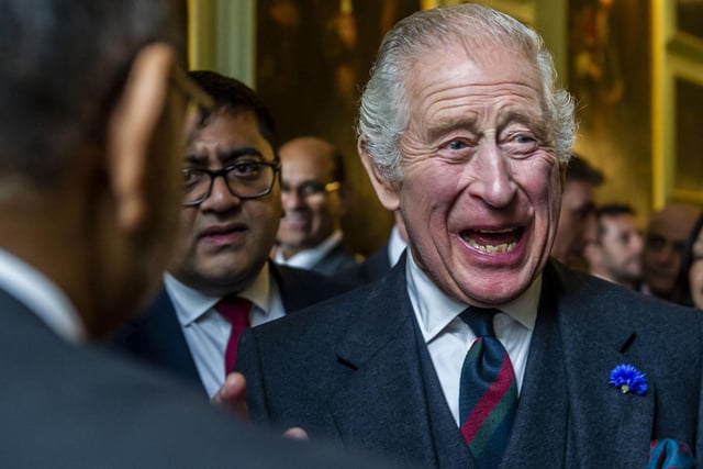 Charles was in good spirits at his first official reception as monarch, which saw hundreds of people pack into Holyroodhouse.