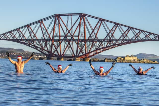 Valts, Linda, Emma and Jana  braved the cold water.