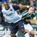 Former Hearts striker Christian Nade tries to move away from Plymouth's Carl Fletcher back in 2009, the last time the two clubs met in a friendly. Picture: SNS