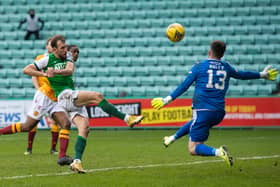 Motherwell goalkeeper Liam Kelly denies Hibs striker Christian Doidge in the second half