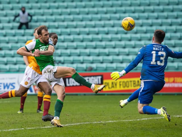 Motherwell goalkeeper Liam Kelly denies Hibs striker Christian Doidge in the second half