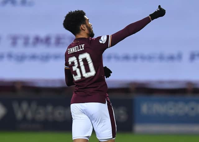 Josh Ginnelly celebrates his goal to make it 6-1 for Hearts against Queen of the South.