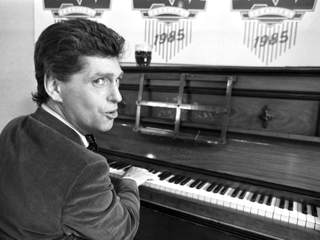 British jazz and blues singer/songwriter Georgie Fame at the piano for the launch of the McEwan's Edinburgh International Jazz Festival in June 1985.