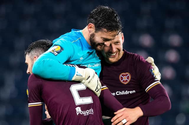 Hearts goalkeeper Craig Gordon celebrates with Michael Smith and Craig Halkett after the Scottish Cup semi-final win over Hibs at Hampden. (Photo by Ross Parker / SNS Group)