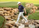 Bob MacIntyre crosses the creek to the 18th hole during the third round of the DP World Tour Championship at Jumeirah Golf Estates in Dubai. Picture: Warren Little/Getty Images.
