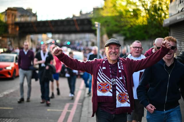 Hearts fans are expected to greet their team back in Edinburgh should the Jambos go on to lift the SPFL title on Saturday afternoon in Glasgow (Photo by ANDY BUCHANAN / AFP via Getty Images)