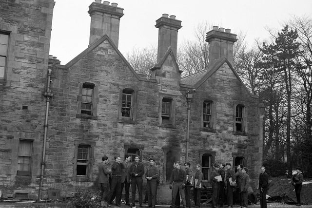 A group of boys outside Fettes College's Carrington House which was gutted by fire in February 1963.