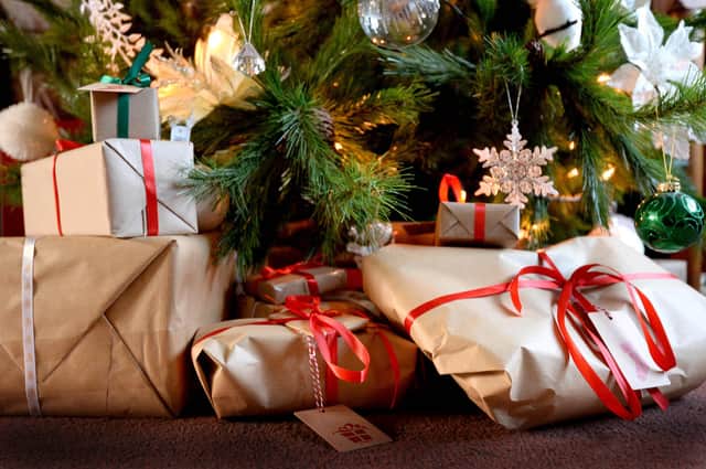 Presents, wrapped inside biodegradable brown paper and cloth ribbon, can also be sustainable (Picture: Nick Ansell/PA Wire)