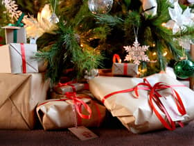 Presents, wrapped inside biodegradable brown paper and cloth ribbon, can also be sustainable (Picture: Nick Ansell/PA Wire)