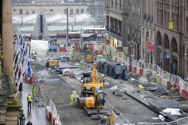 This photo shows construction teams hard at work on the new tram line, on the section between St Andrew Square and Princes Street.