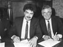 David Duff, left, pictured alongside Kenny Waugh as he signs the paperwork at Easter Road to buy Hibs back in 1987