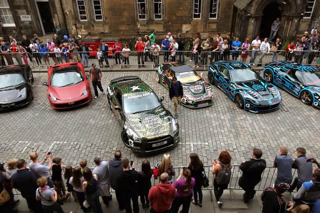 Supercars lined up outside Edinburgh's Rutland Hotel in 2014 as Gumball 3000 rally drivers displayed their vehicles in celebration of the event's first trip to the city. Picture: Andrew Milligan/PA Wire