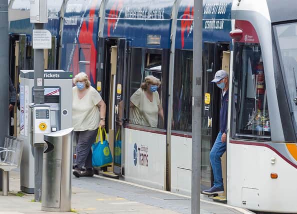 Passengers at Princes Street tram stop during the ongoing coronavirus pandemic