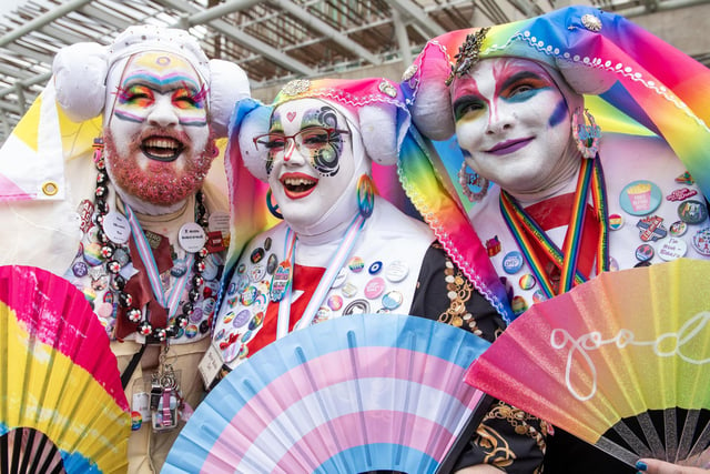The streets of the Capital filled with people in colourful costumes, fans and badges. Photo: Lesley Martin/PA Wire