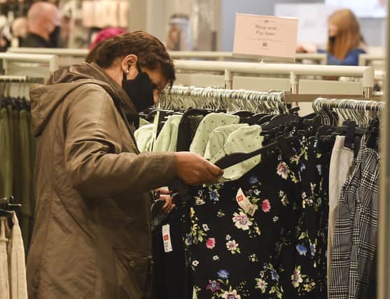 Shops are open once again and customers are most observing the safety proceedures designed to stop the spread of coronavirus (Picture: LIsa Ferguson)