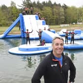Gullane Under 11’s Football Team make a splash at Foxlake Adventures as they rise to the challenge to test the new 100m Aqua Park.  Pictured with the team are James Barbour (Director Foxlake Adventures) and Forth One’s Arlene Stewart. Pic Greg Macvean 05/05/2023