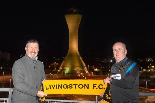 Edinburgh Airport chief executive Gordon Dewar, left, shows the transport hub's support for Livingston with Lions boss David Martindale