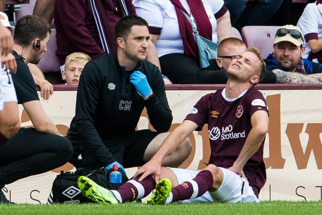 Nathaniel Atkinsonpicks up an injury against St Johnstone at Tynecastle Park on August 28. Picture: Ross Parker / SNS