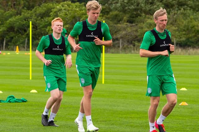 Josh Doig (middle) is highly-rated at Easter Road. Picture: SNS