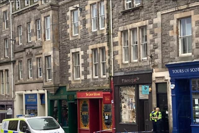 Police cordon in place around shop on Edinburgh's Royal Mile. PIC: Matt Donlan