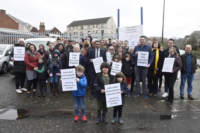 Residents, joined by MSPs and councillors,stage a protest against the first proposal.  Picture: Greg Macvean
