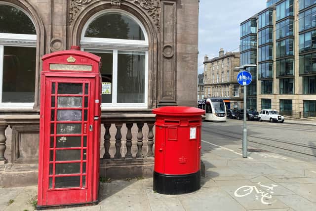 There is a new phone mast in this old phone box on St Andrew Square in Edinburgh.
